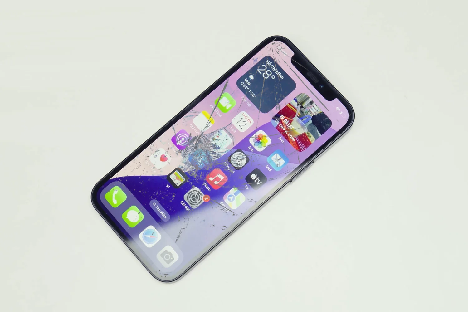 thay-mat-kinh-ep-kinh-iphone-12-chinh-hang.html-thay-kinh